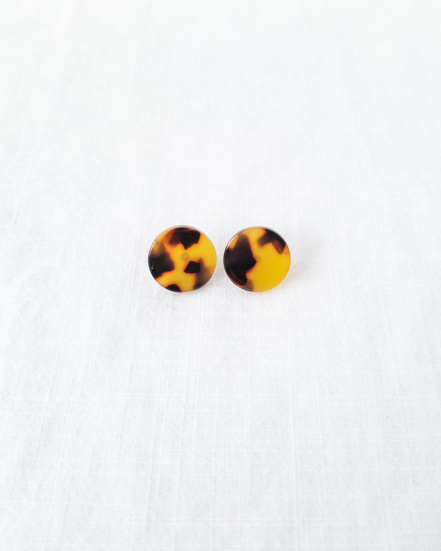 Round tortis studs